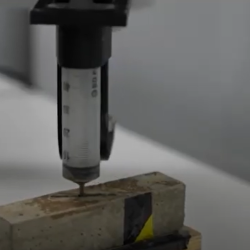 Demonstration of automated crack filling, PhD student Samuel Schaefer