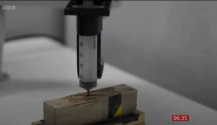 Demonstration of automated crack filling, PhD student Samuel Schaefer